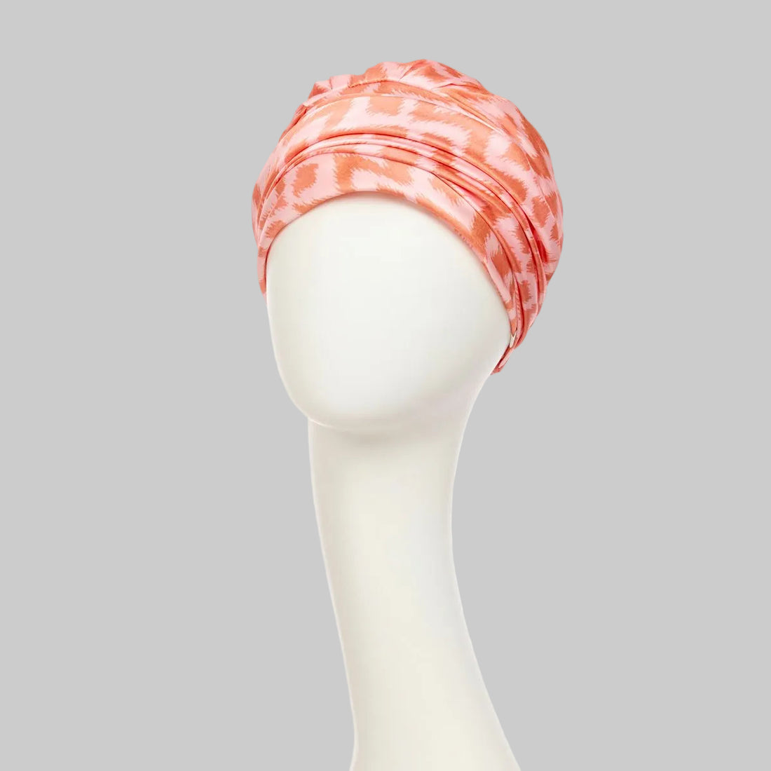 Sapphire Boho Turban Ikat Orange de Christine Headwear con banda integrada y estampado ikat en tonos naranja